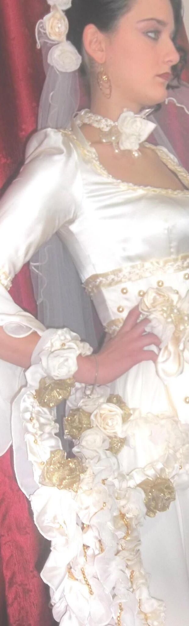Bespoke wedding dress with bell sleeves and long cascade fabric-rose bouquet