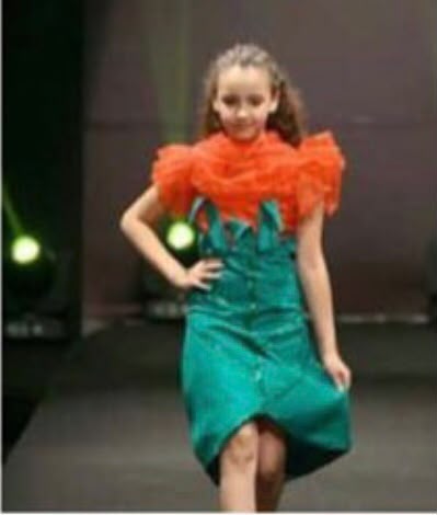 Girls dress by Anna Stella on the runway at our fashion show